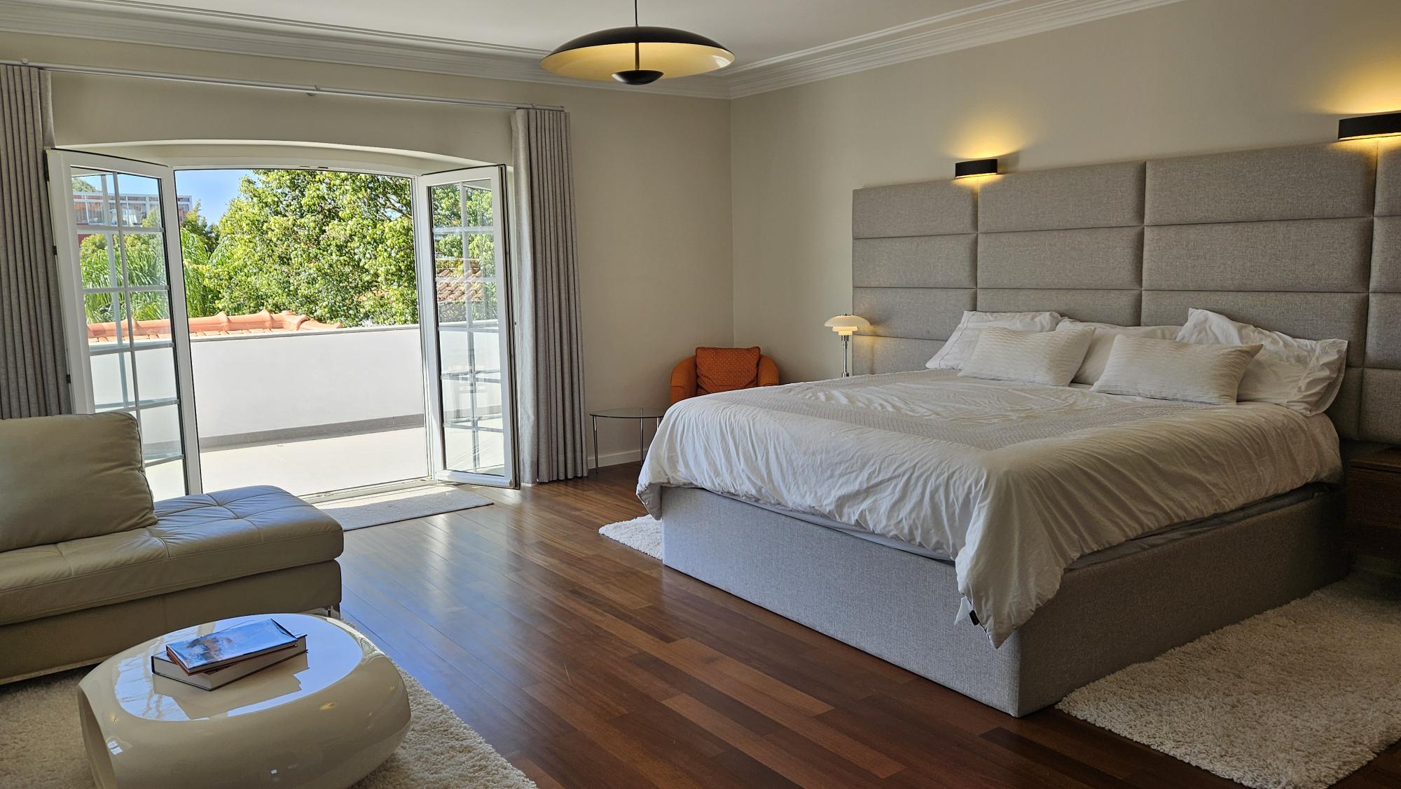 Upstairs Master Suite lounge with wooden ceiling