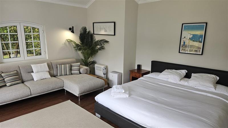 Cabana Bedroom #10 with lounge and garden doors