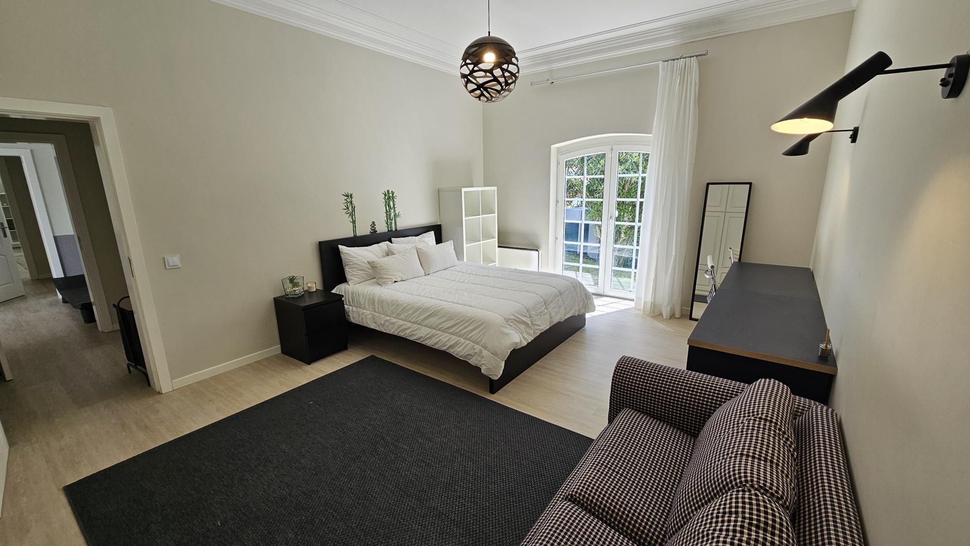 Ensuite Bedroom #3 lounge and garden doors