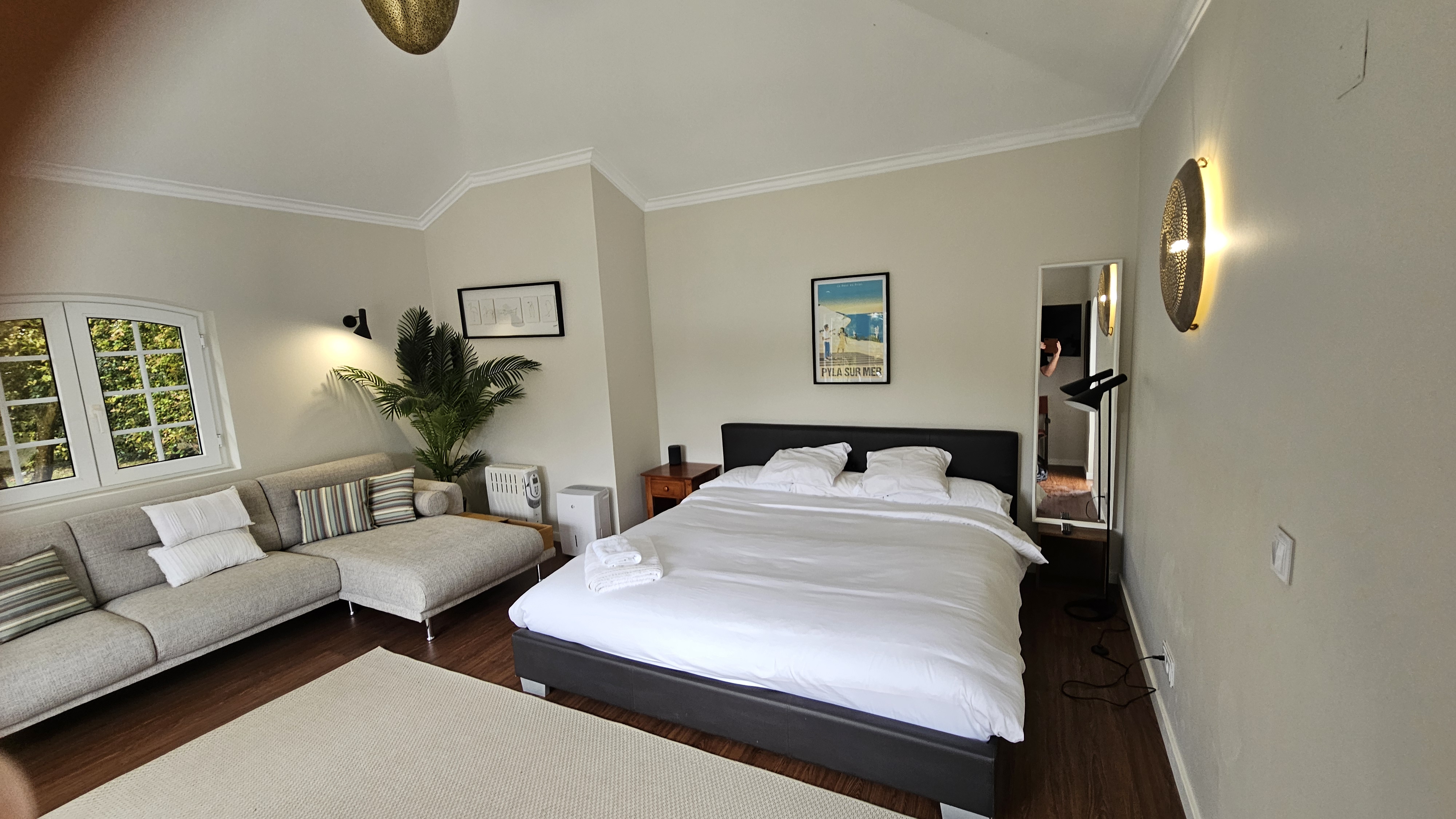 Cabana Bedroom #10 with bed, lounge and garden doors